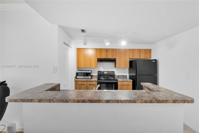 Foto del edificio - 5880 W Sample Rd