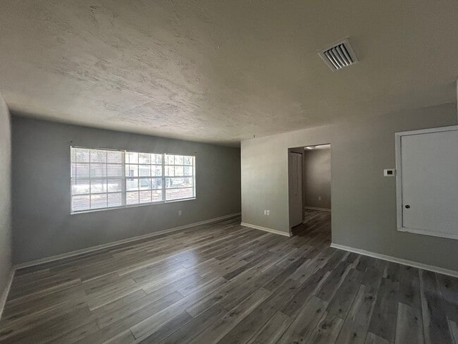 Building Photo - HALF OFF RENT!! 2/1 with Covered Porch nea...