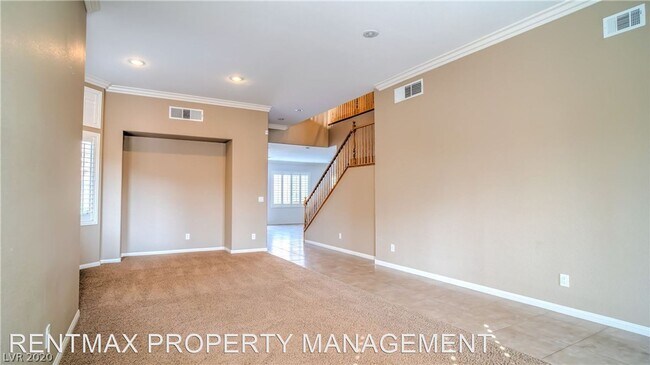 Building Photo - 5 br, 4.5 bath House - 9228 DESERT HEAT AVE