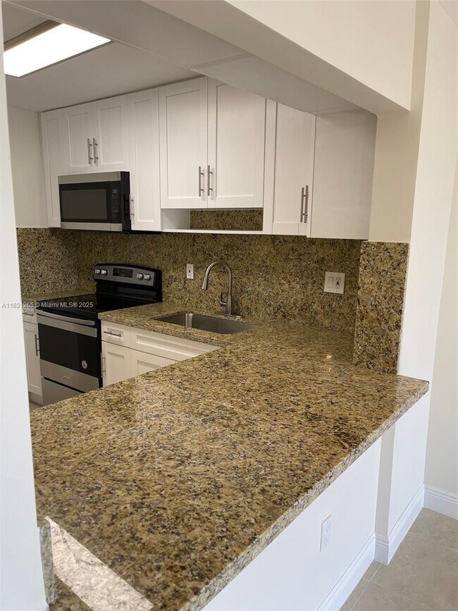 Foto del edificio - 6090 W 18th Ave