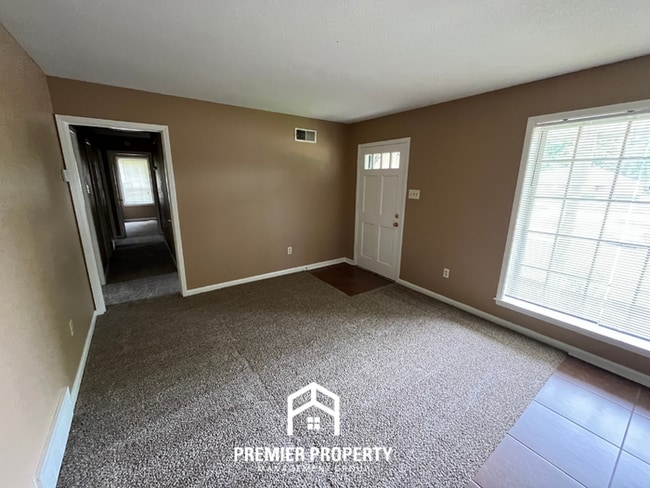 Building Photo - Spacious 4BR/2BA Whitehaven Home | 1,701 Sq Ft, Brick Fireplace & Quiet Cove