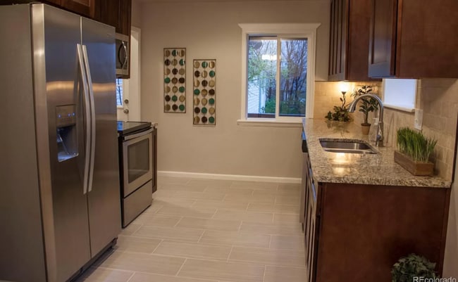 Photo - 7739 N Raleigh St House