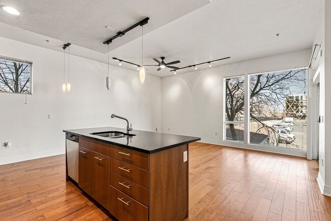 Building Photo - Fantastic Condo With Central AC And 1 Reserved Garage Parking Space!