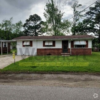 Building Photo - 104 S 13th Ave