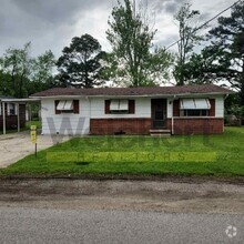 Building Photo - 104 S 13th Ave