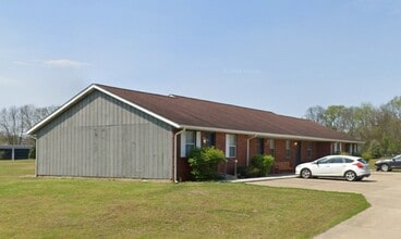 Building Photo - 8701 N Raintree Ct