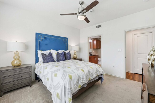 Enjoy a peaceful night’s rest in your beautifully designed bedroom. - McDermott 55