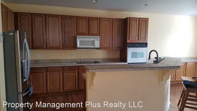 Foto del edificio - 6733 Thistle Ridge Ave