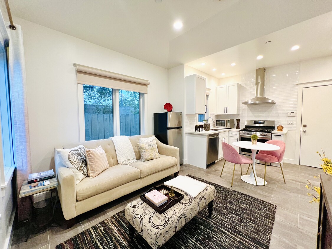 Living room with adjoining full kitchen - 4206 Pomona Ave