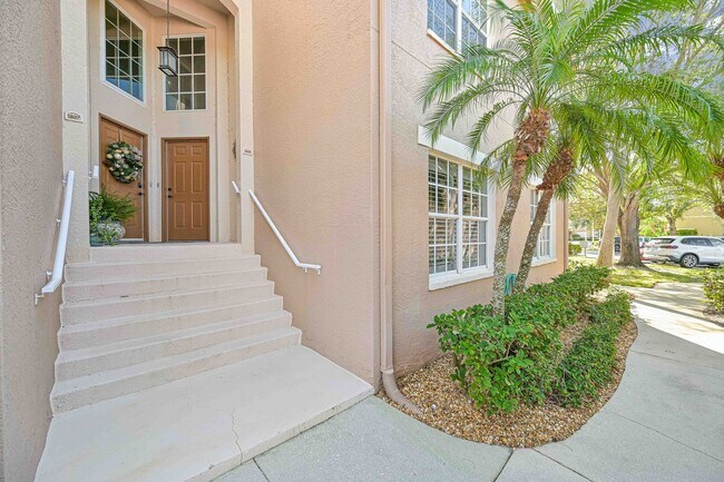 Building Photo - Now Available - 2nd Story Condo with Lake ...