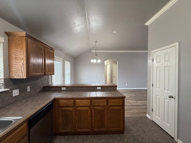 Building Photo - 4 BED! Cozy Home on Large CORNER Lot!