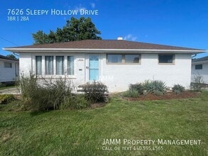 Building Photo - 7626 Sleepy Hollow Dr