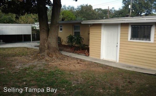 Building Photo - 3 br, 1 bath House - 4104 W Mango Ave