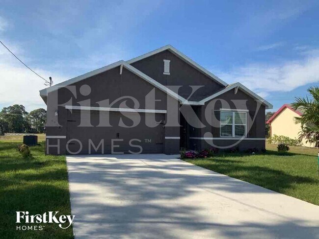 Building Photo - 6938 NW Daffodil Ln