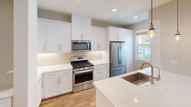 Building Photo - Bayfront Coastal Condo at The Strand | 3BR + 2-Car Garage, Resort-Style Amenities