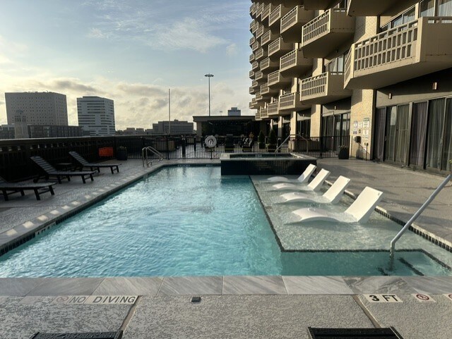 High rise living with pool, hot tub, outdoor grills, gym, social room, outdoor fireplace,door people - 2016 Main St