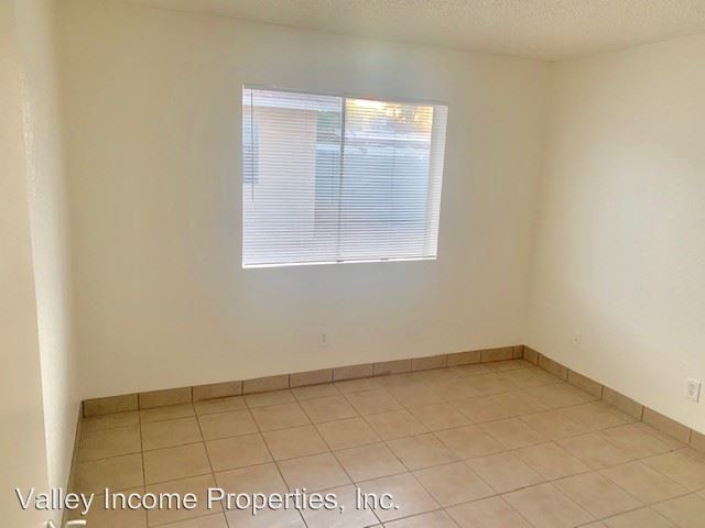 Building Photo - 10015 N 9th Ave