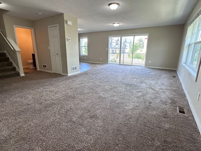 Building Photo - Champlin Corner Unit Town Home, 2 Car Garage, Dishwasher, Washer/Dryer, Balcony