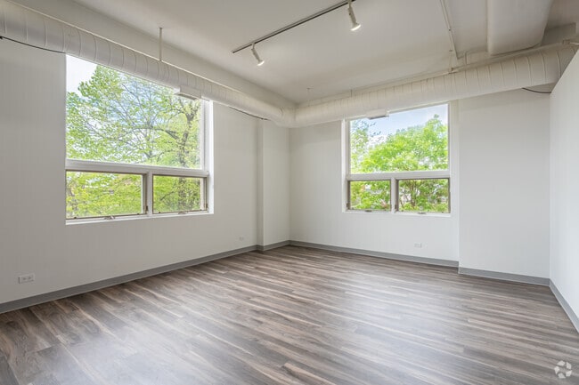 2BR, 1BA - 1,350SF - Living Room - Downer Place Lofts