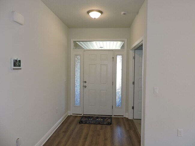 Building Photo - Almost new four bedroom home with solar pa...