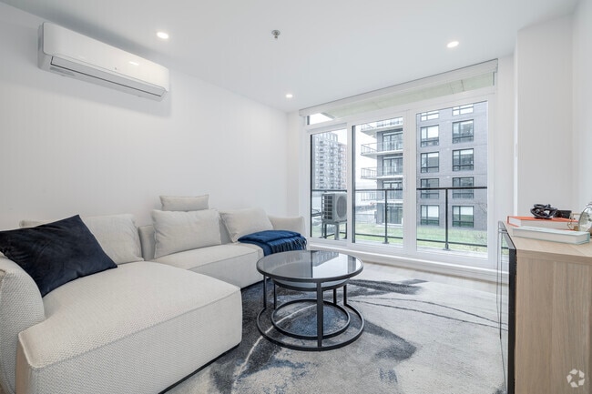 3 chambres, 2 salles de bain - 1155 pi² - Salon - H1 Harmonie - 550 & 560 Delmar