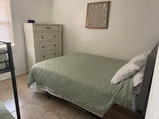 Bedroom with Queen bed and bunkbeds - 680 Carver Rd