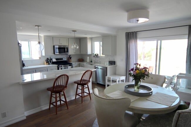 Dining room and kitchen - 800 N Juanita Ave Townhome