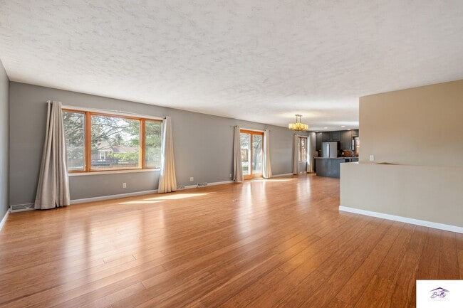 Building Photo - Available now! Spacious 3 Bed, 3 Bath Home with Modern Open Layout & Lawn Care Included