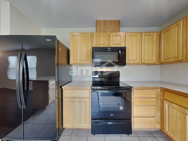 Foto del edificio - 6651 S Acacia Ave