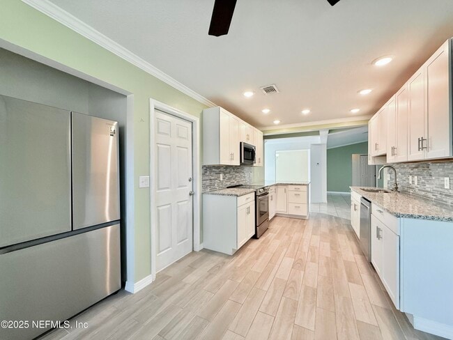 Foto del edificio - 10373 Windfern Ct N
