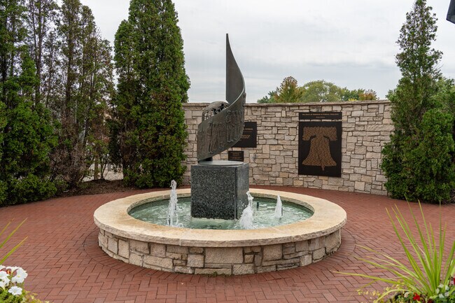 Beautiful memorial fountain can be seen near the ample parking at Round Lake's Metra station.