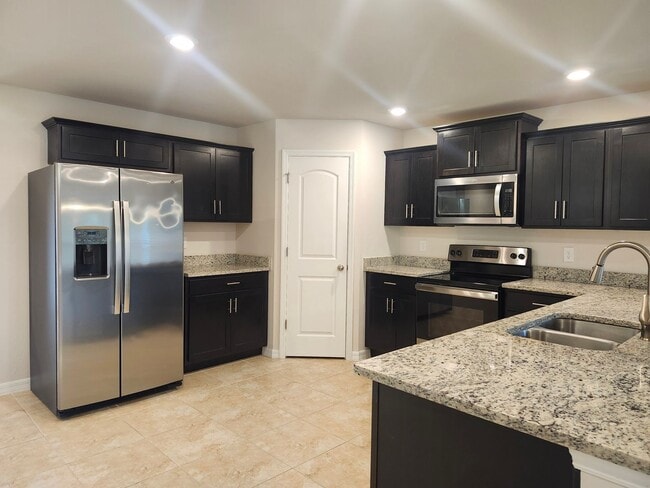 Building Photo - 3-2-2 off Kismet Parkway