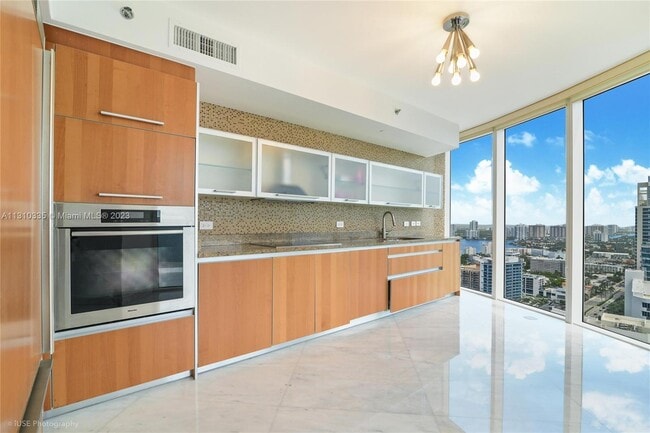 Building Photo - 17201 Collins Ave