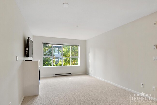 Building Photo - Introducing a charming 2 bed, 2 bath condo with a spacious patio fit for entertaining -  Located ...