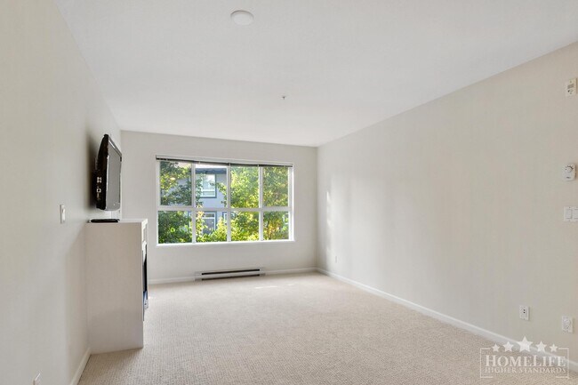 Photo du bâtiment - Introducing a charming 2 bed, 2 bath condo with a spacious patio fit for entertaining -  Located ...