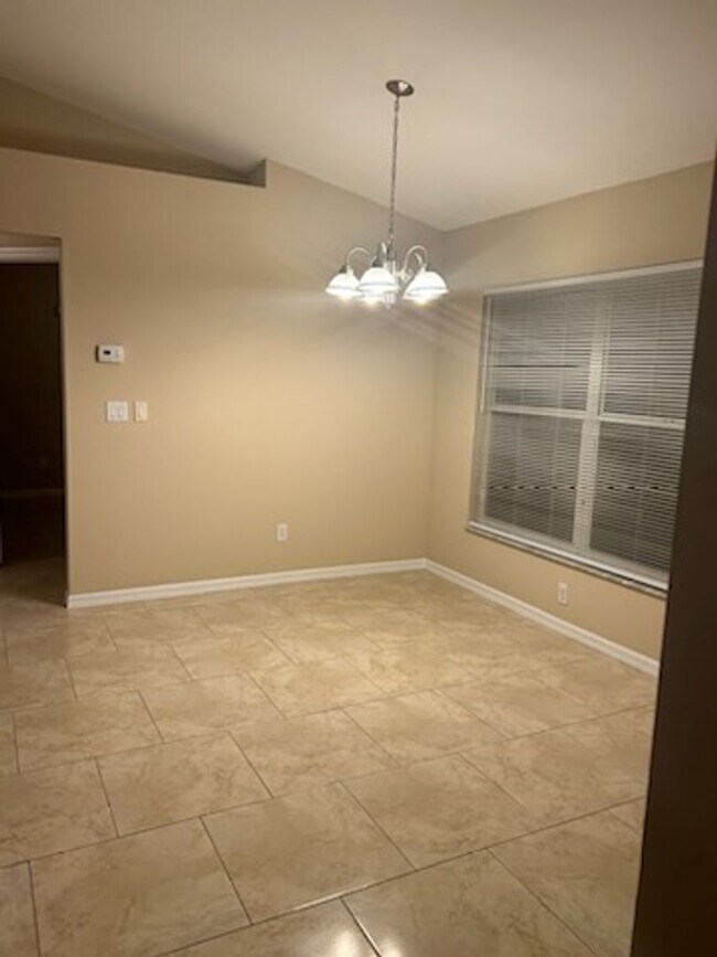 Building Photo - SW area All Tiled Home with a Fenced in Ya...