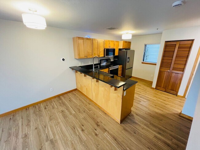 Photo - Top Floor 1bdrm Condo with River Views and Private Deck | FREE reserved parking Included!