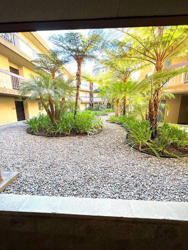 Building Photo - Large Condo with Parking Near Mission Trails!