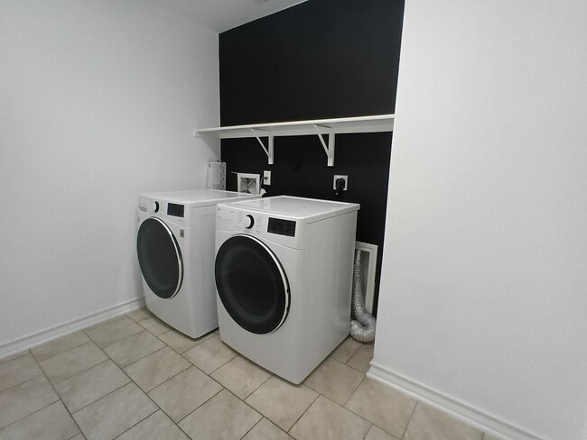 Building Photo - Spacious 4-Bedroom Home with Washer & Dryer Included in Riposa Vita Community!