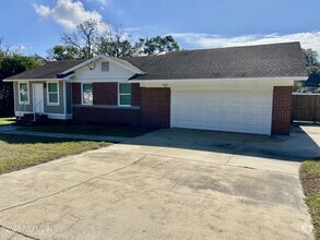 Building Photo - 9720 Jupiter Ct S