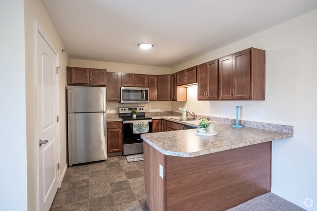 2BR, 1BA - 825 SF - Kitchen - Beaver Run Senior Apartments