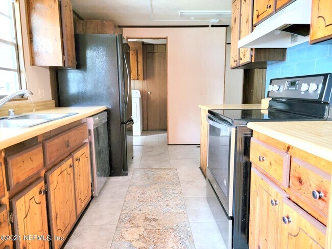 Foto del edificio - 7631 Timberwood Dr