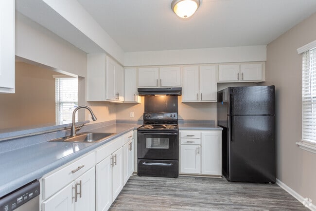 2BR, 1.5BA - 1,079SF - Kitchen - Colony Townhomes