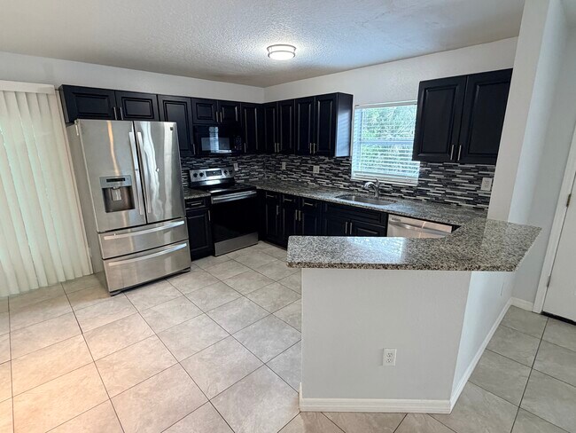 Building Photo - 2416 E 18th Ave