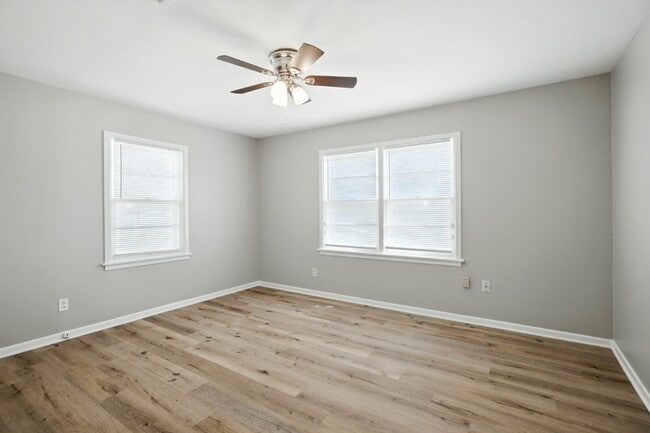 Building Photo - Fresh Paint, New Floors, and a Fresh Start!