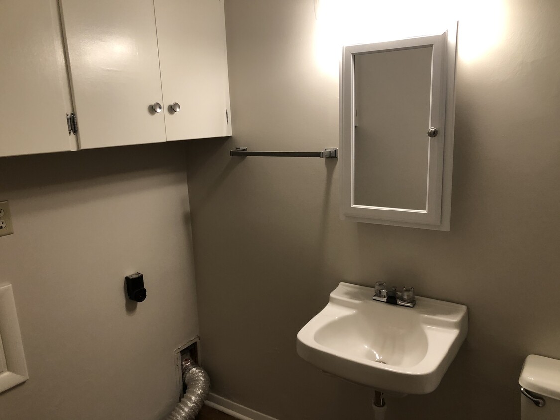 half bath w/ washer and dryer hook-up - 91 Port Sheldon St