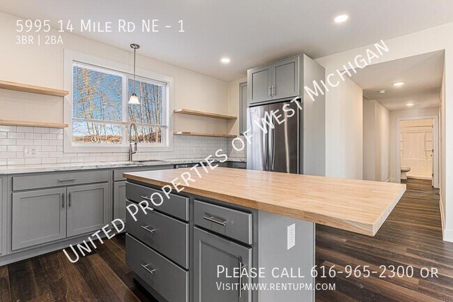 Foto del edificio - 5995 14 Mile Rd NE