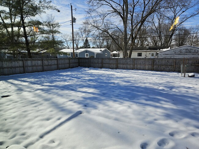 Fenced Backyard - 10912 N Park Ave