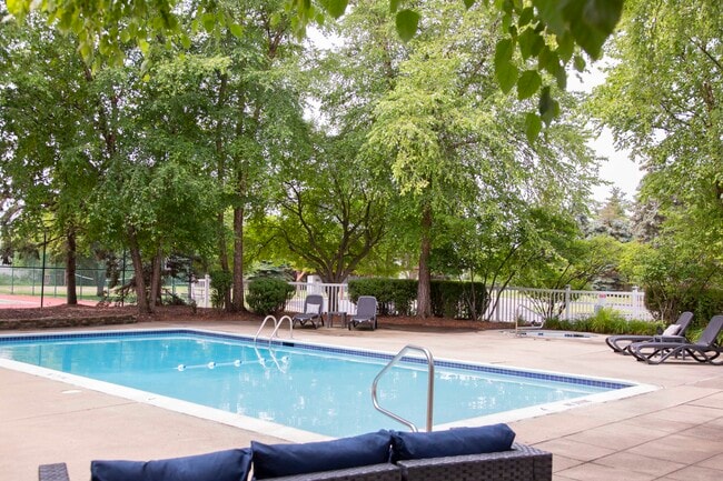 Sparkling Swimming Pool - Whispering Winds Apartments