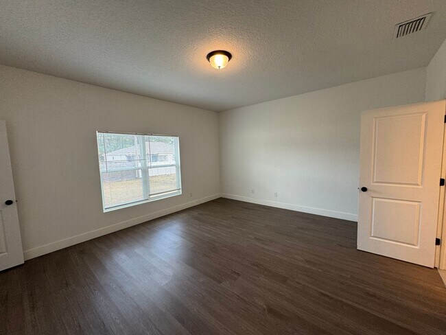 Building Photo - BEAUTIFUL 4 BD/2 BA Home in Palm Bay! Great Location!